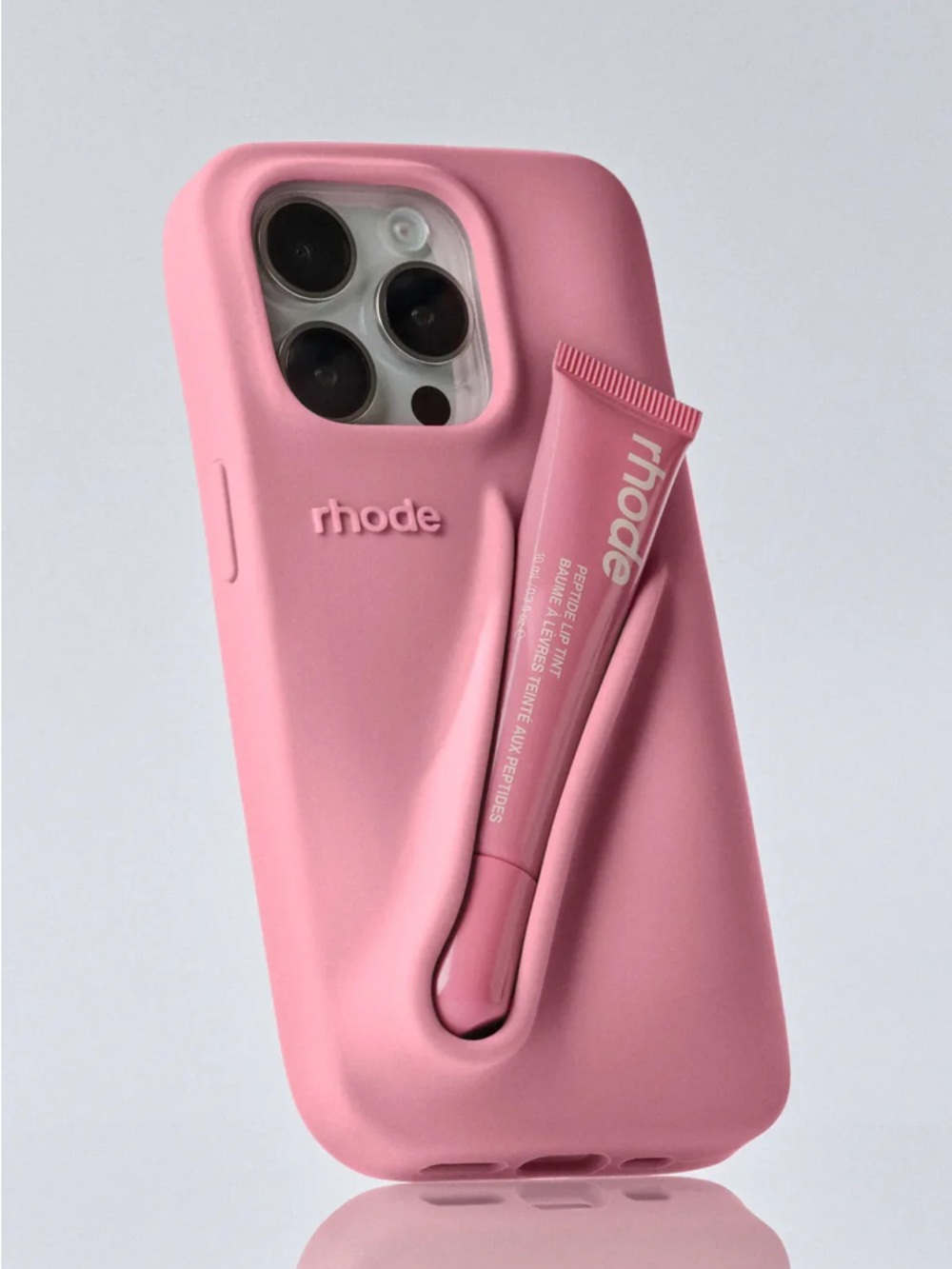 RHODE iPhone 14 Pro Pink Silicone Phone Case with Built-In Lip Tint Holder